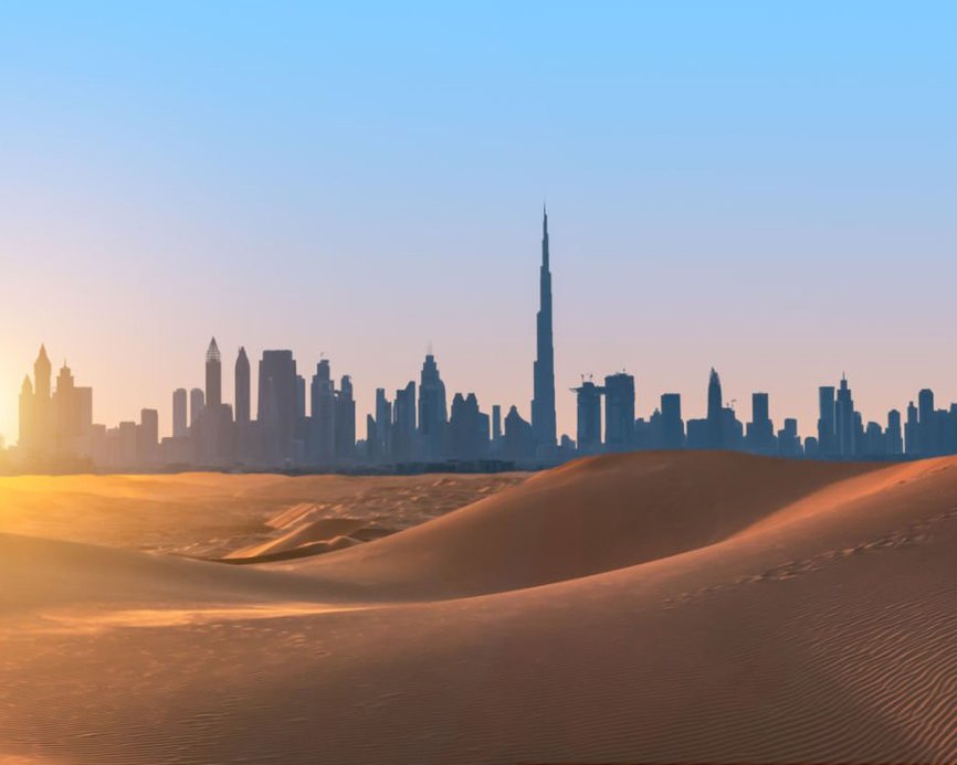 Dubai city skyline sand dunes